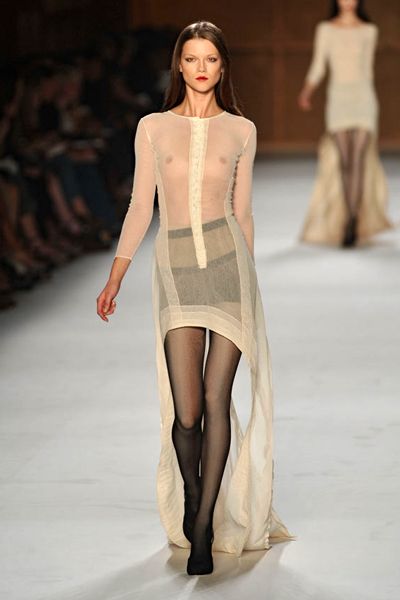 Clothing, Fashion show, Brown, Shoulder, Human leg, Joint, Runway, Outerwear, Fashion model, Style, 