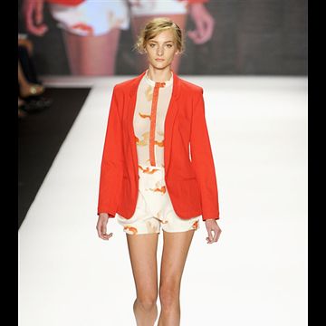 Clothing, Fashion show, Shoulder, Human leg, Red, Joint, Runway, Outerwear, Fashion model, Style, 