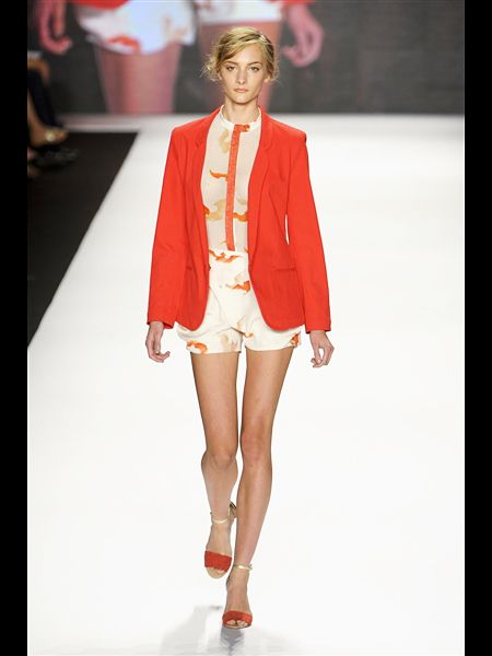 Clothing, Fashion show, Shoulder, Human leg, Red, Joint, Runway, Outerwear, Fashion model, Style, 