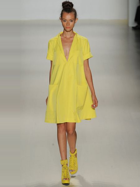 Clothing, Yellow, Sleeve, Shoulder, Fashion show, Dress, Joint, Fashion model, Style, One-piece garment, 