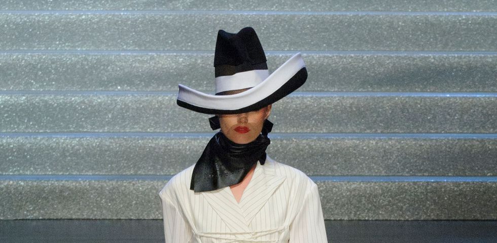 Clothing, Hat, Shoulder, Joint, Outerwear, Fashion show, Style, Fashion accessory, Fashion model, Sun hat, 