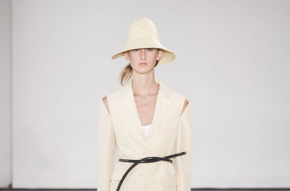 Clothing, Sleeve, Hat, Shoulder, Fashion show, Joint, Outerwear, Style, Runway, Fashion model, 