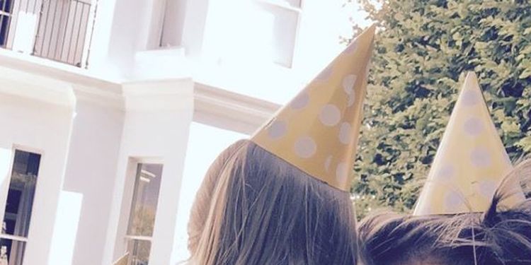 Head, Nose, Human, Party hat, Flag, Costume accessory, Long hair, Cone, Costume hat, Love, 
