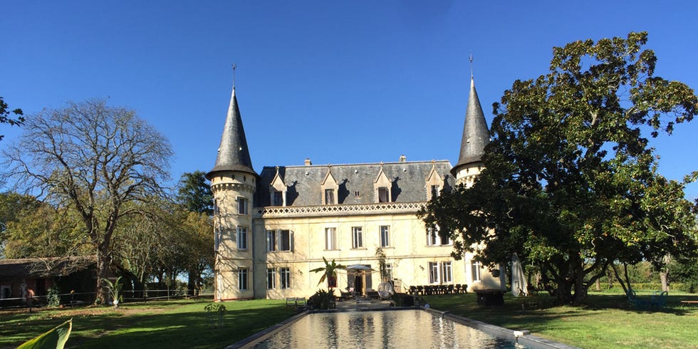 Table, Swimming pool, Spire, Steeple, Hardwood, Shade, Outdoor furniture, Rectangle, Mansion, Villa, 