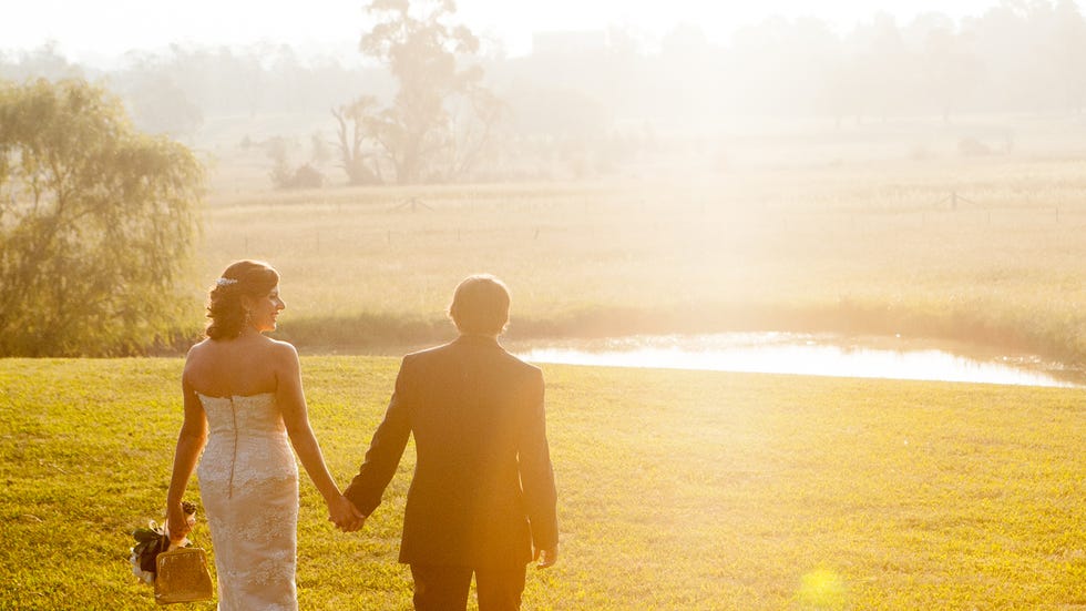 Dress, Yellow, Bridal clothing, Bride, Photograph, Happy, Wedding dress, Coat, People in nature, Gown, 