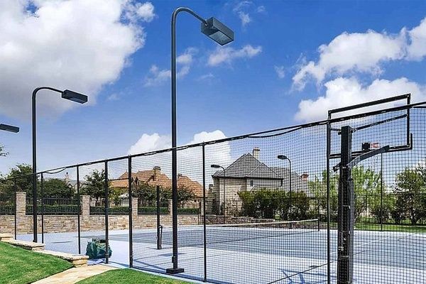 Property, Grass, Fence, Sport venue, Real estate, Iron, Architecture, Net, Mesh, Chain-link fencing, 
