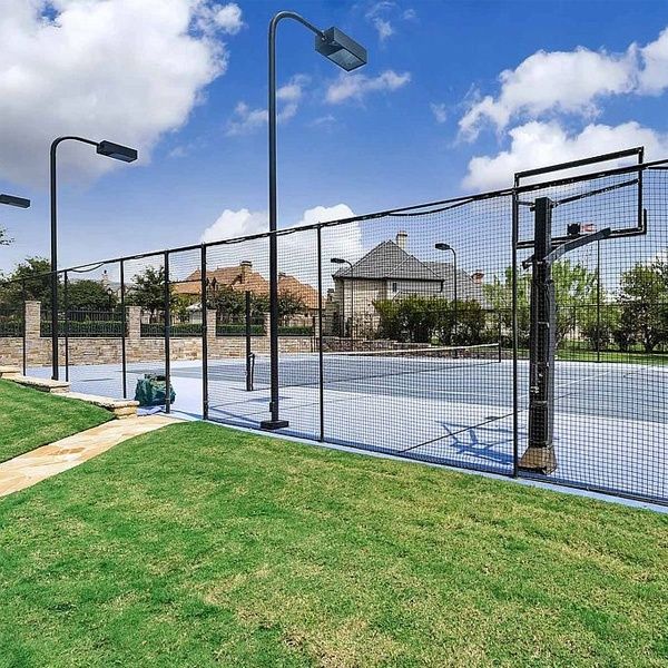 Property, Grass, Fence, Sport venue, Real estate, Iron, Architecture, Net, Mesh, Chain-link fencing, 
