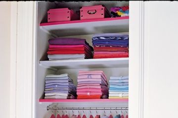 Textile, Room, Pink, Clothes hanger, Closet, Collection, Aqua, Shelving, Home accessories, Dye, 