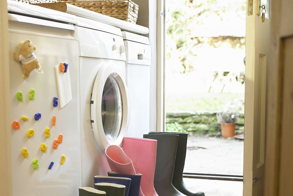 Washing machine, Clothes dryer, Floor, Flooring, Major appliance, Laundry room, Rain boot, Boot, Arch, Home appliance, 