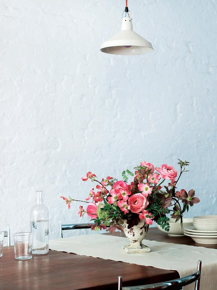 Bouquet, Petal, Room, Flower, Table, Glass, Pink, Wall, Light fixture, Interior design, 