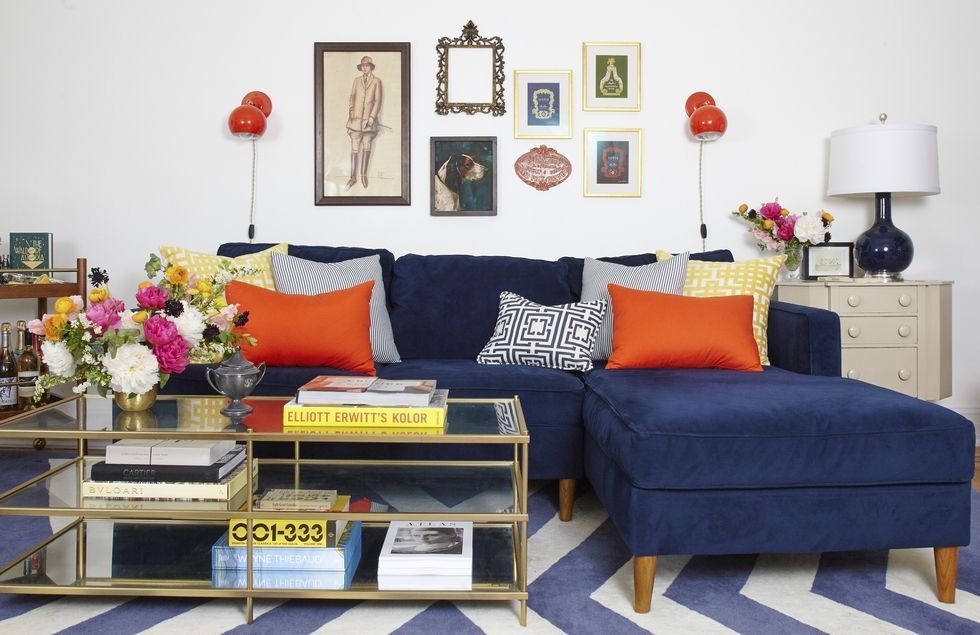 Living room, Furniture, Room, Couch, Orange, Interior design, Blue, Yellow, Table, Coffee table, 