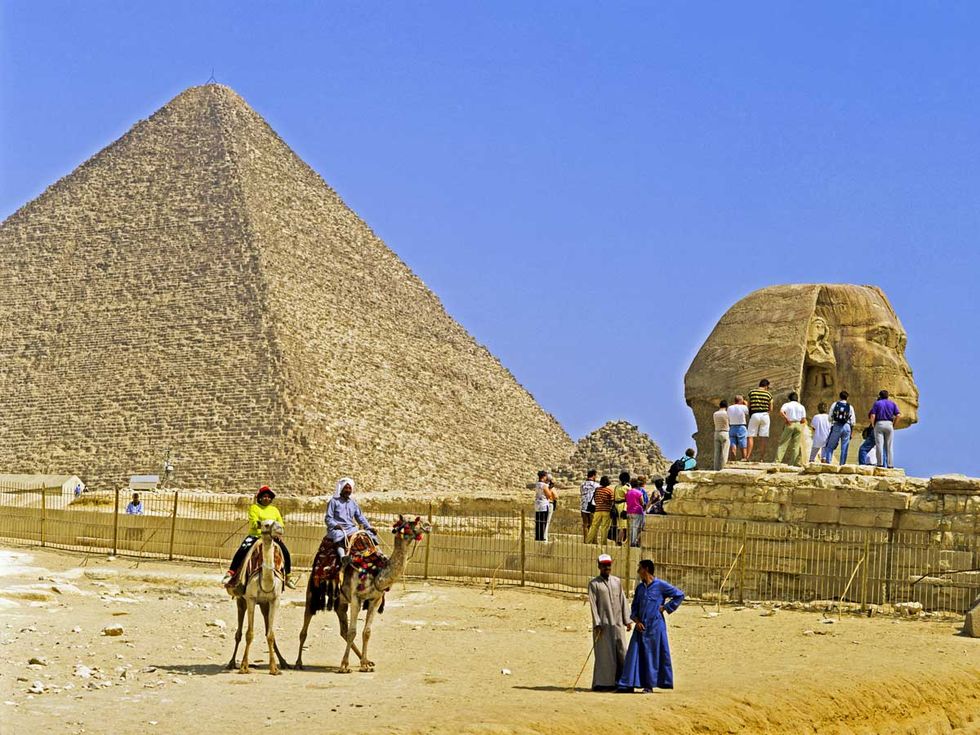 Human, Tourism, Pyramid, Landscape, Landmark, Ancient history, Wonders of the world, History, Travel, Vacation, 