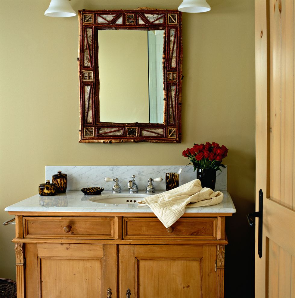 Wood, Room, Interior design, Wall, Cabinetry, Drawer, Interior design, Bathroom sink, Tap, Mirror, 