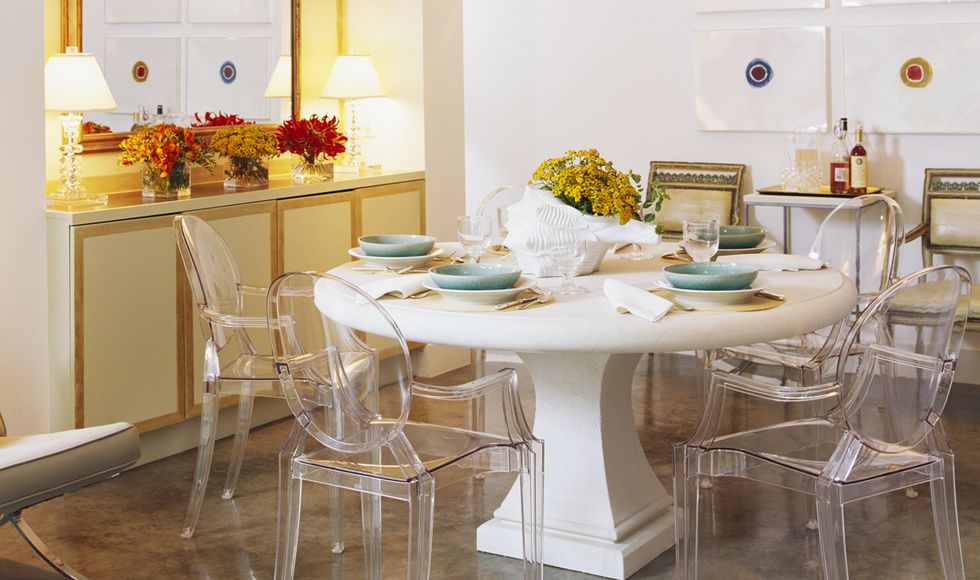 Lighting, Room, Tablecloth, Yellow, Interior design, Furniture, Table, Floor, Dishware, Flooring, 