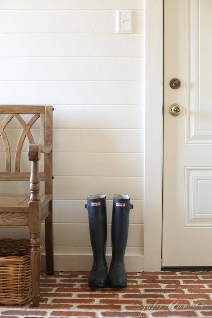 Wood, Door, Floor, Hardwood, Home door, Fixture, Wood stain, Boot, Rain boot, Door handle, 