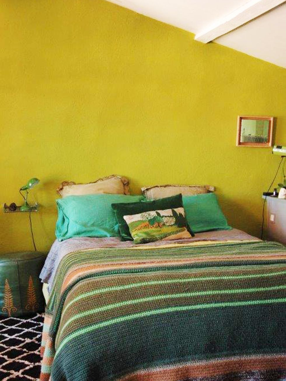 Bed, Green, Room, Yellow, Lighting, Bedding, Interior design, Bedroom, Bed sheet, Textile, 