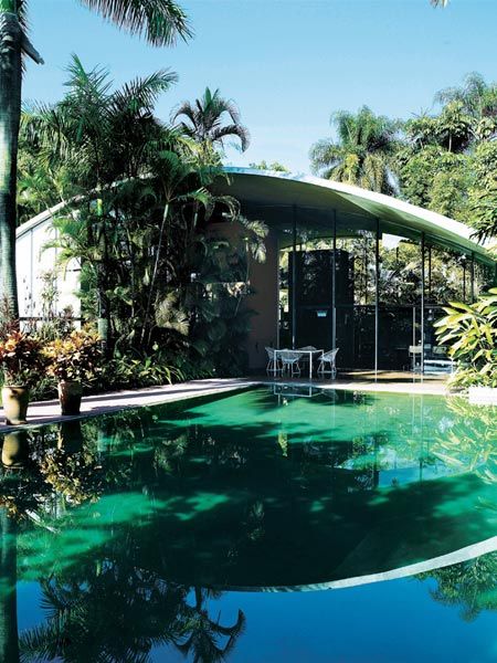 Property, Swimming pool, Reflection, Real estate, Resort, Woody plant, Arecales, Villa, Shade, Garden, 
