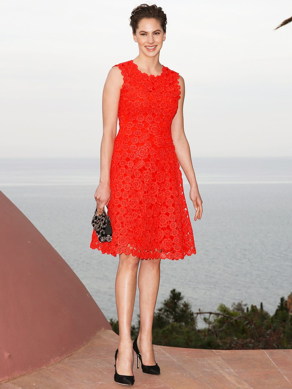 Dress, Sleeve, Shoulder, Human leg, Standing, Red, Joint, One-piece garment, Waist, Day dress, 