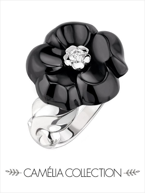 Petal, Font, Monochrome photography, Body jewelry, Black-and-white, Artificial flower, Silver, Gemstone, Ring, Graphics, 