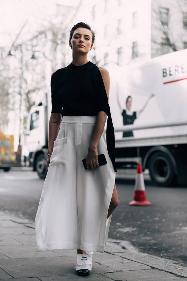 White, Road surface, Style, Street fashion, Waist, Cone, Truck, Commercial vehicle, Tar, Fashion design, 
