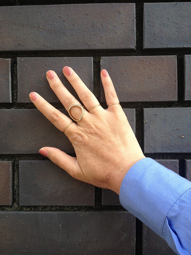 Finger, Wrist, Brick, Pattern, Colorfulness, Rectangle, Thumb, Nail, Gesture, Beige, 