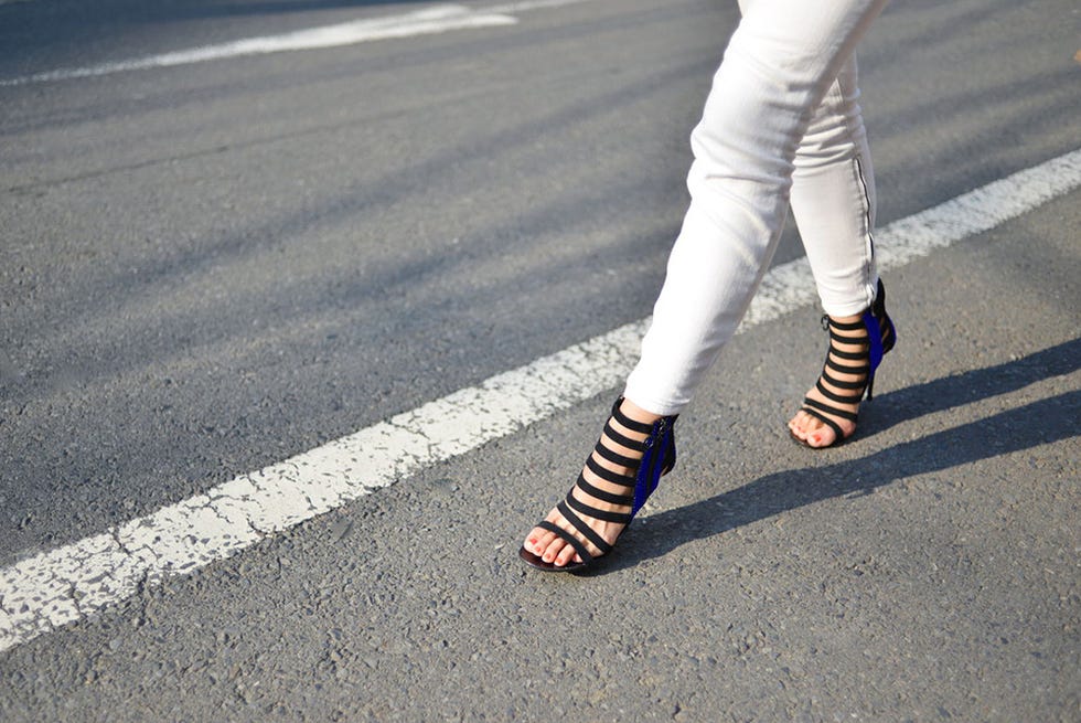 Human leg, Road, Asphalt, Road surface, Street fashion, Foot, Toe, Ankle, Tar, Sock, 