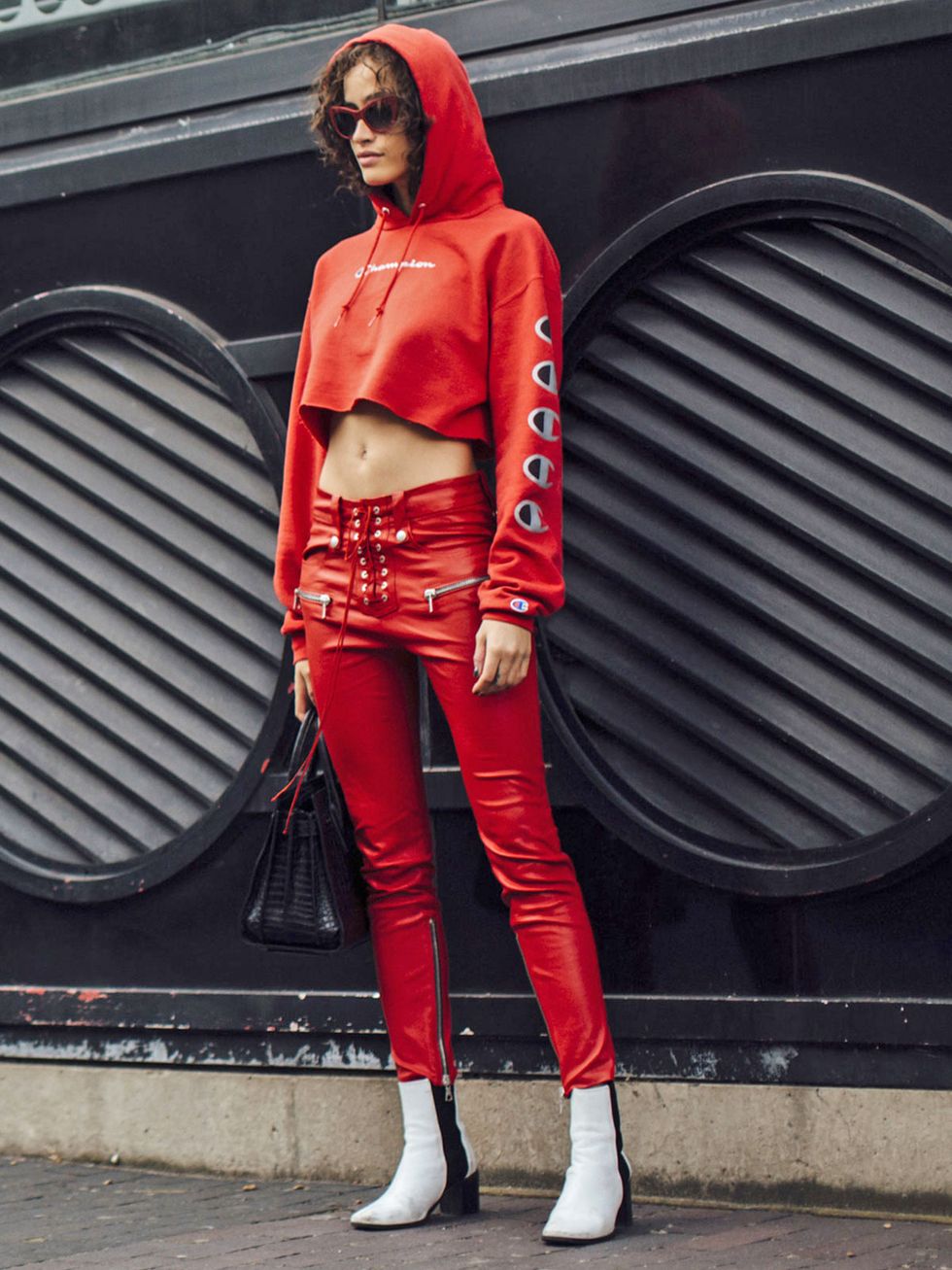 Clothing, Red, Jeans, Street fashion, Fashion, Outerwear, Latex clothing, Footwear, Jacket, Waist, 
