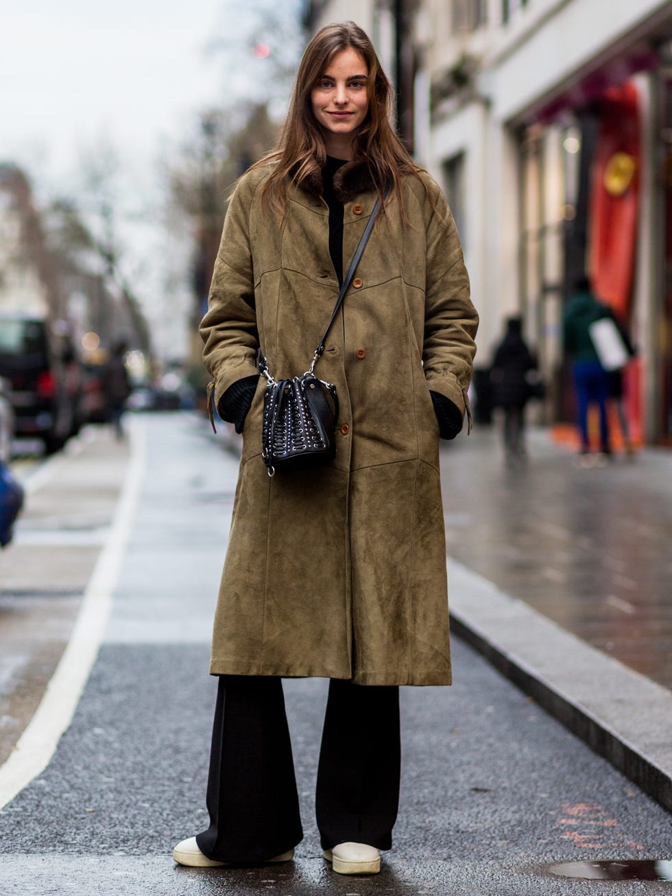 Brown, Sleeve, Textile, Photograph, Outerwear, Standing, Bag, Style, Street fashion, Coat, 
