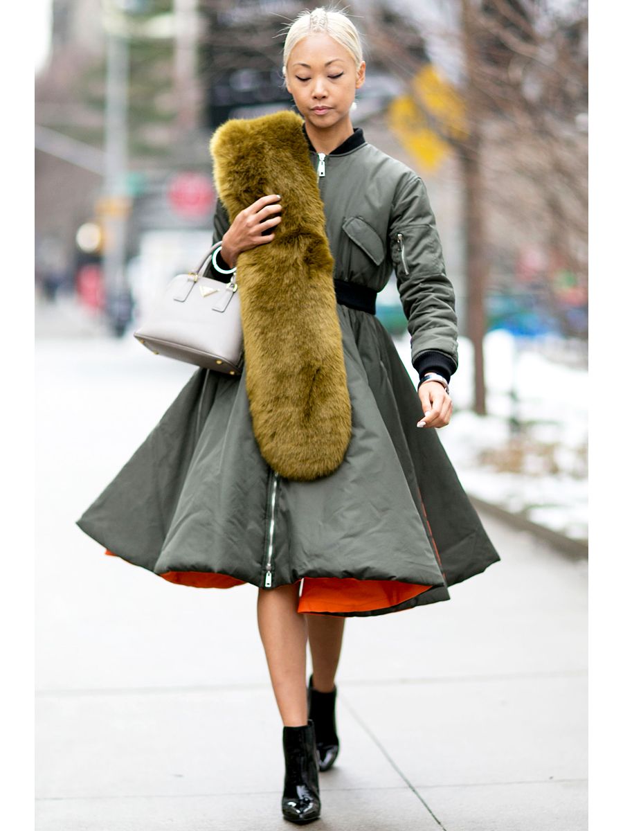 Textile, Winter, Street fashion, Bag, Knee, Fur clothing, Fashion, Toy, Natural material, Boot, 