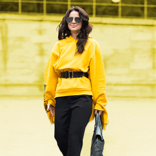 Clothing, Yellow, Sleeve, Bag, Shoulder, Joint, Outerwear, Style, Street fashion, Waist, 