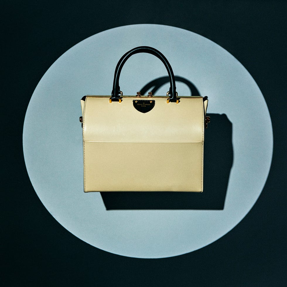 Bag, Beige, Shoulder bag, Khaki, Material property, Circle, Label, Padlock, Security, Strap, 