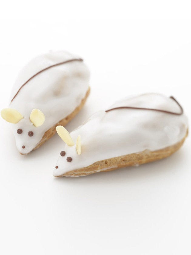 White, Toy, Beige, Tan, Fawn, Snout, Finger food, Animal figure, 