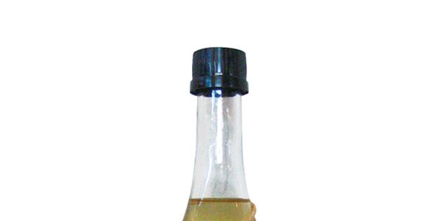 Liquid, Bottle cap, Bottle, Glass bottle, Alcohol, Alcoholic beverage, Drink, Distilled beverage, Label, Liqueur, 