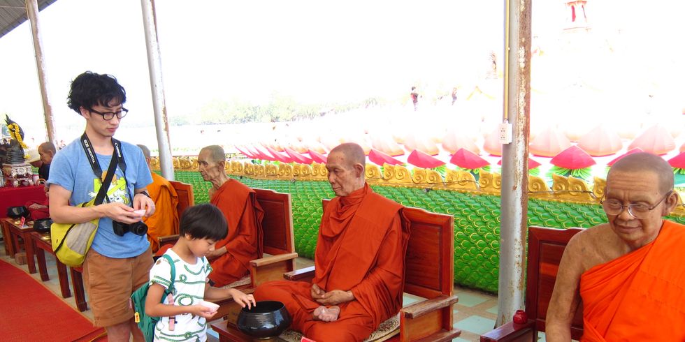 Sitting, Guru, Temple, Monk, Maroon, Lama, Place of worship, Zen master, Drum, Sangharaja, 