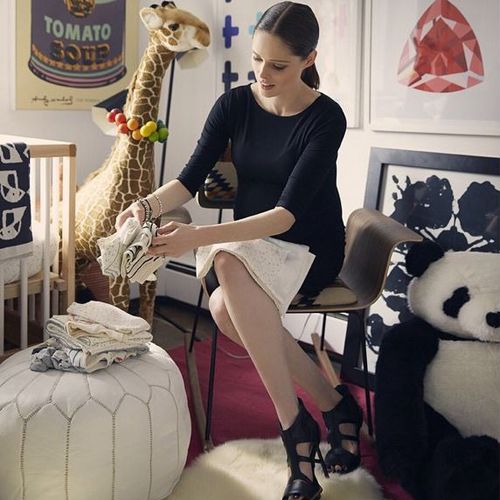 Human, Toy, Bag, Stuffed toy, Interior design, Boot, Tights, High heels, Picture frame, Panda, 