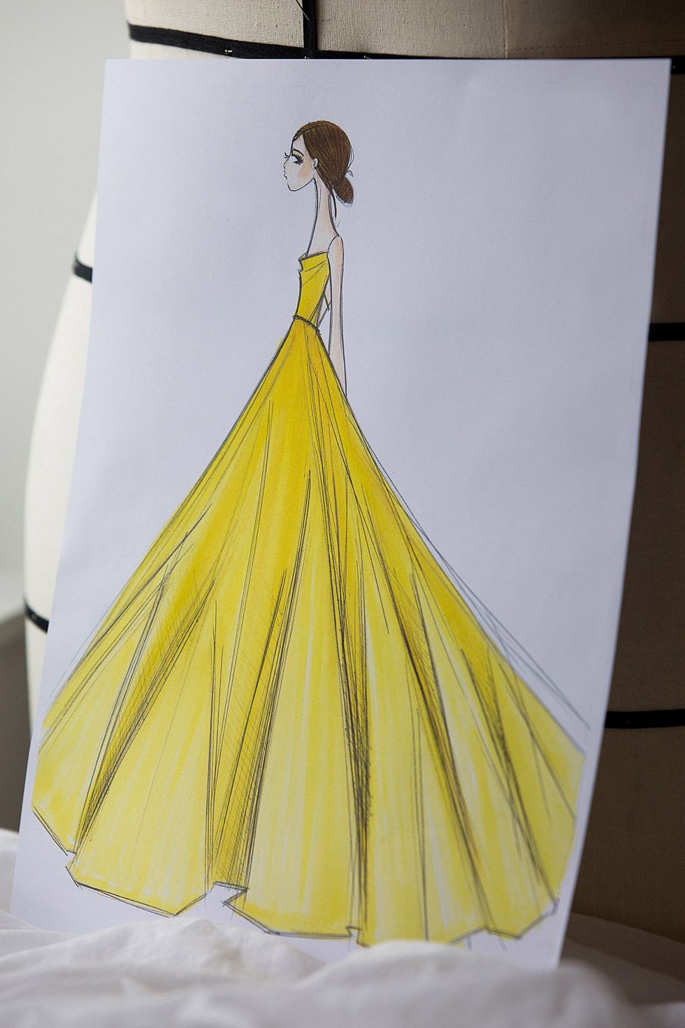 Yellow, Textile, Dress, Costume design, Fashion, Pattern, Gown, One-piece garment, Paper product, Design, 