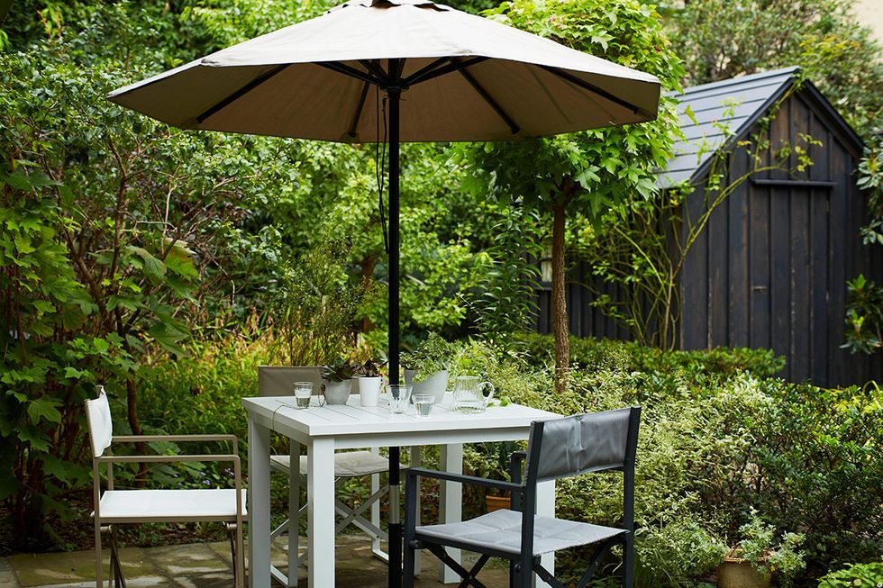 Table, Furniture, Outdoor table, Outdoor furniture, Shade, Garden, Umbrella, Groundcover, Outdoor structure, Patio, 