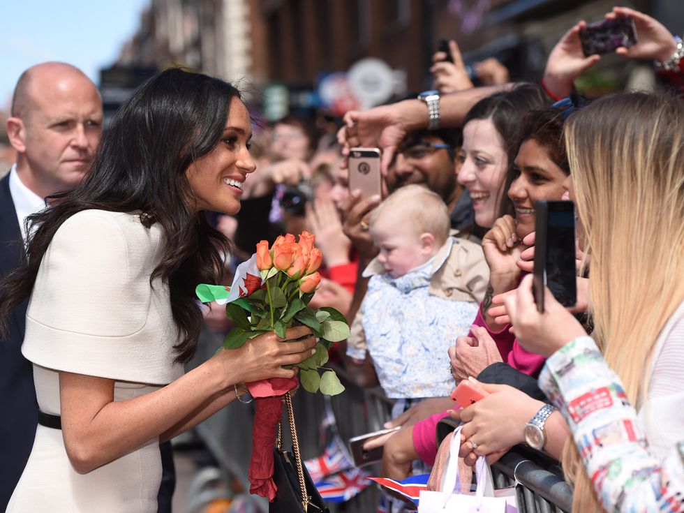 Hair, Head, Arm, People, Hand, Happy, Coat, Bouquet, Facial expression, Interaction, 