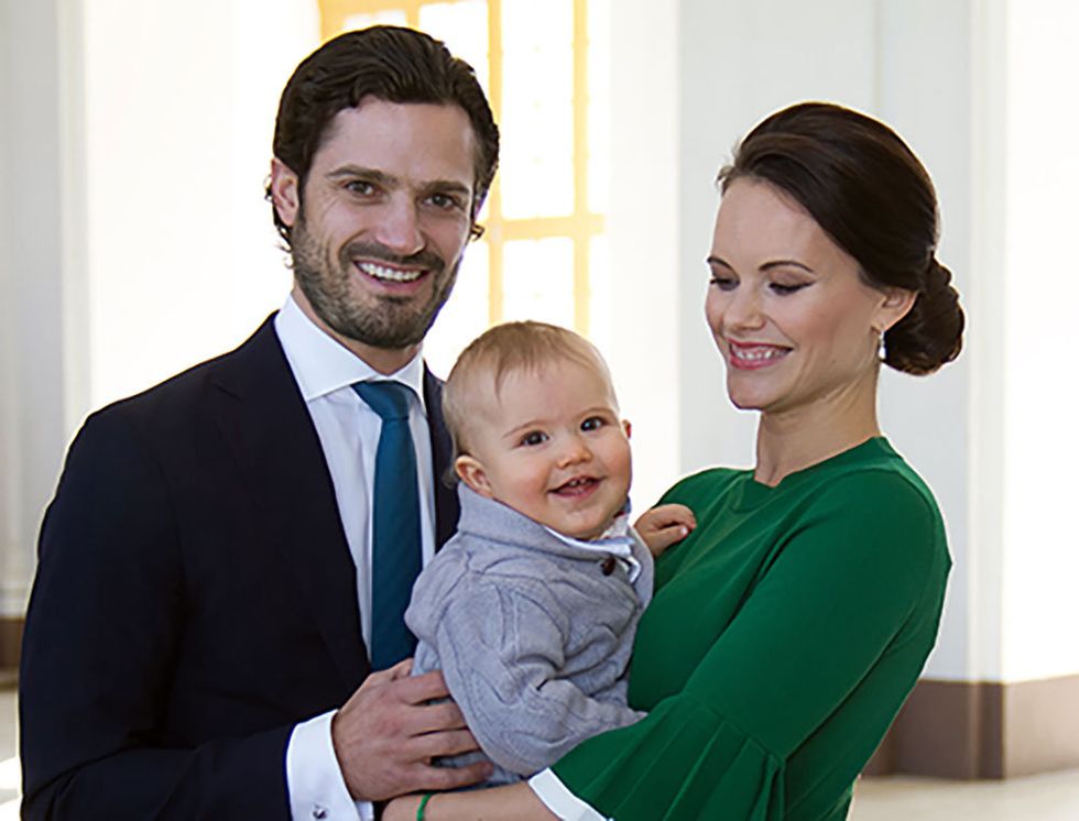 People, Family taking photos together, Child, Smile, Formal wear, Event, Family pictures, Toddler, Photography, Suit, 