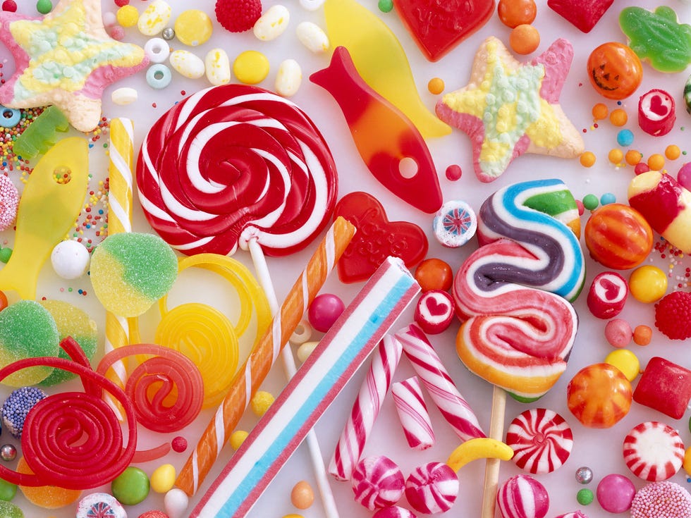 Sweetness, Colorfulness, Confectionery, Candy, Stick candy, Hard candy, Snack, Cuisine, Spiral, Lollipop, 