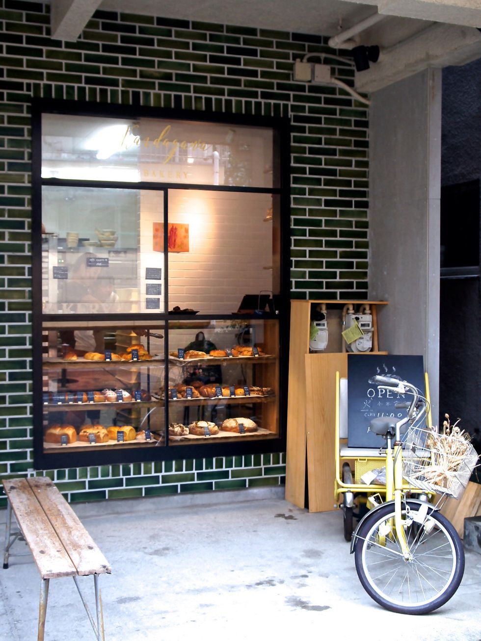 Building, Architecture, Furniture, Room, Interior design, Bakery, Table, Door, Vehicle, Bicycle, 