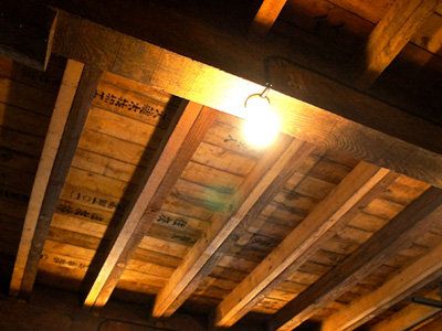 Wood, Ceiling, Hardwood, Amber, Light fixture, Beam, Light, Tints and shades, Wood stain, Ceiling fixture, 