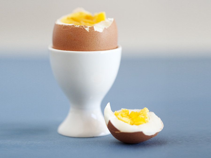 Egg, Egg cup, Boiled egg, Food, Egg, Egg yolk, Serveware, Ingredient, Dish, Deviled egg, 