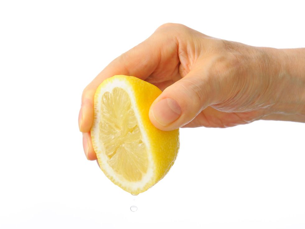 Finger, Skin, Citrus, Fruit, Meyer lemon, Ingredient, Lemon, Citric acid, Natural foods, Lemon peel, 