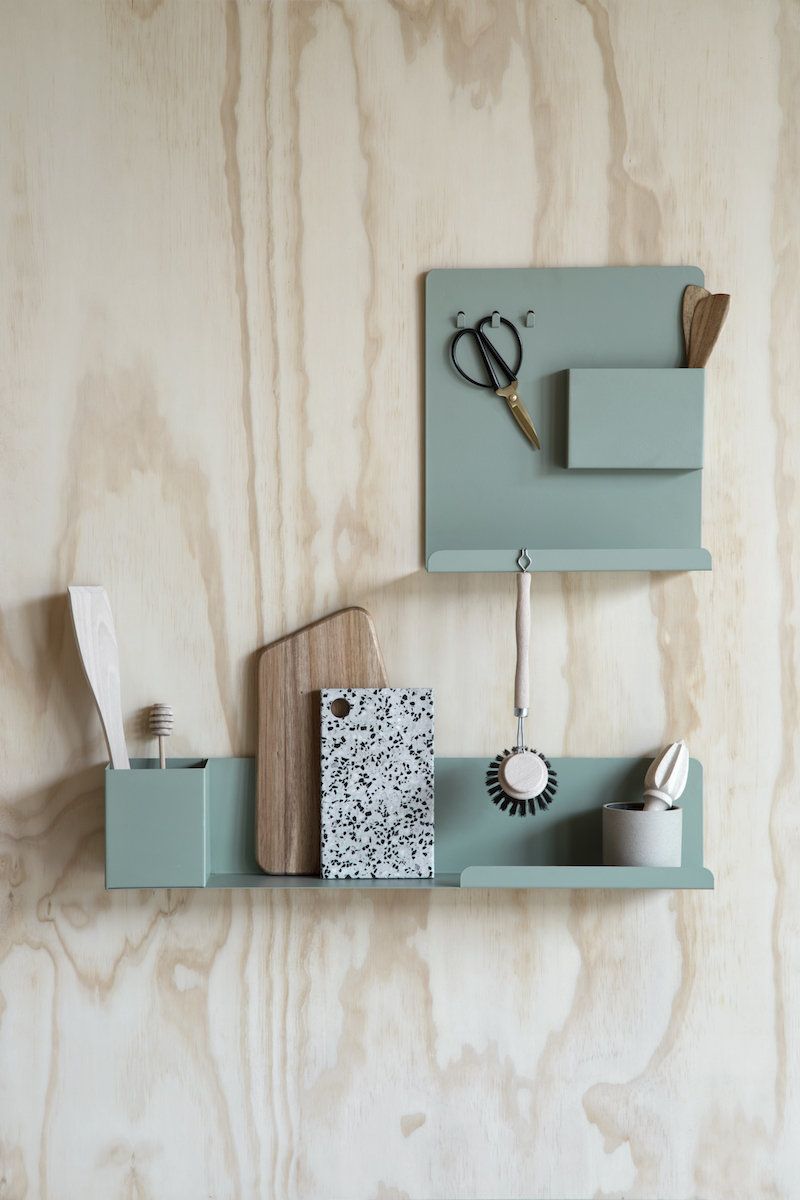 Shelf, Wall, Turquoise, Furniture, Shelving, Room, Material property, Table, Rectangle, Wallpaper, 