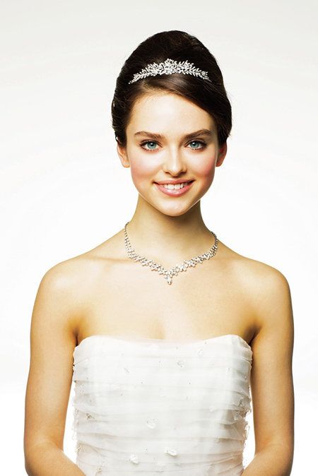 Clothing, Lip, Smile, Hairstyle, Skin, Strapless dress, Shoulder, Bridal clothing, Photograph, Joint, 