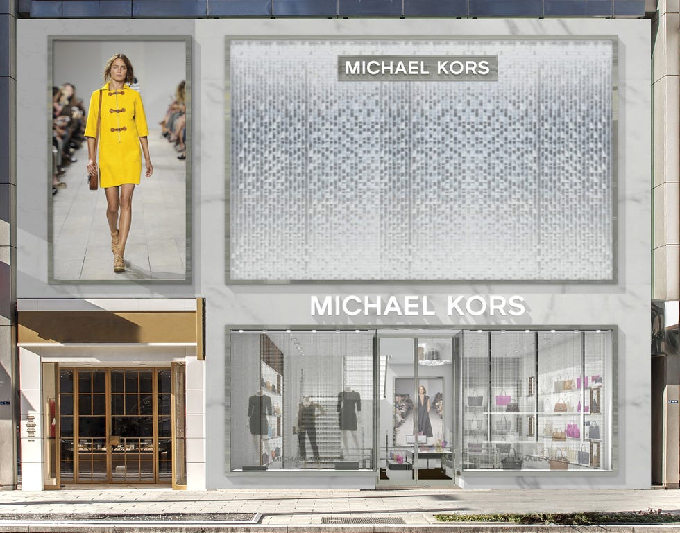 Text, Facade, Commercial building, Advertising, Street fashion, Door, Sidewalk, Signage, Outlet store, Display window, 