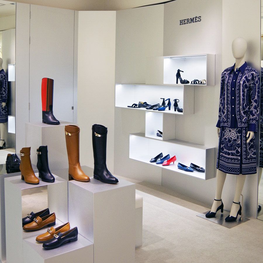Boot, Dress, Collection, One-piece garment, Mannequin, Shelf, Shelving, Shoe store, Rain boot, Day dress, 