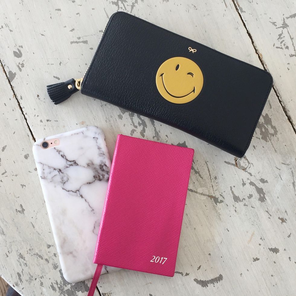 Pink, Wallet, Coin purse, Leather, Fashion accessory, Material property, Technology, Smile, Paper product, Magenta, 