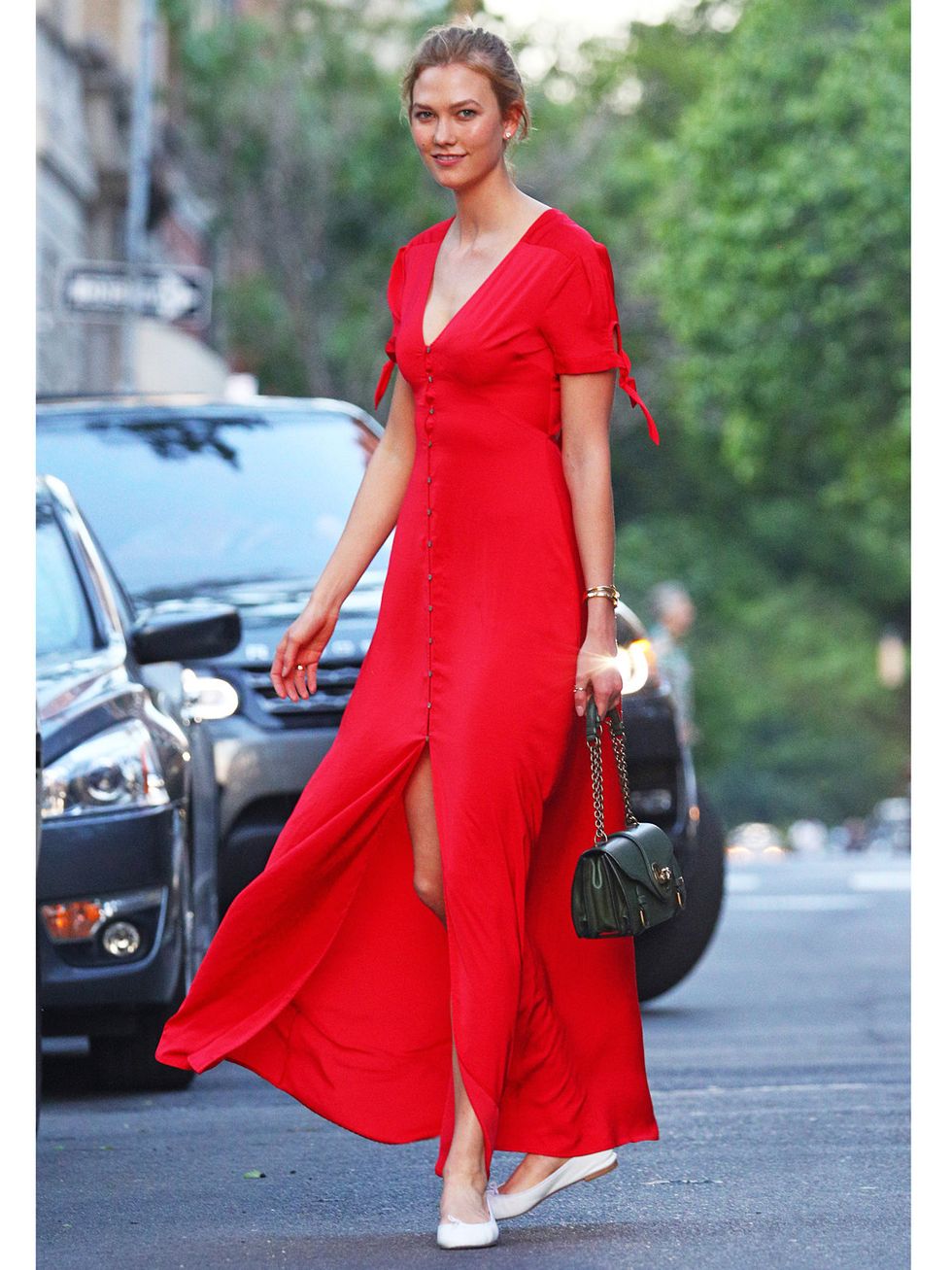 Clothing, Dress, Fashion model, Red, Shoulder, Street fashion, Fashion, Gown, Haute couture, Formal wear, 